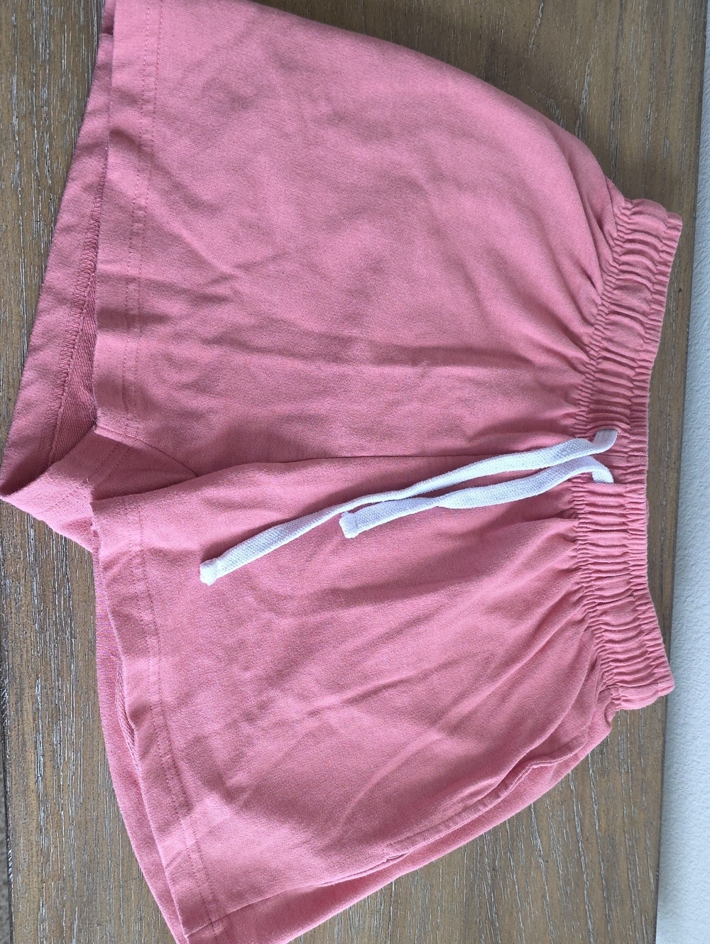 Essentials Pink Athletic Drawstring Shorts with White Tie